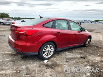 Trzecie zdjęcie samochodu z tyłu: 2017 FORD FOCUS SE VIN:1FADP3F26HL311990 - miniatura
