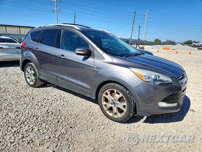 Czwarte zdjęcie samochodu z boku: 2014 FORD ESCAPE TITANIUM VIN:1FMCU0J9XEUA04339 - miniatura