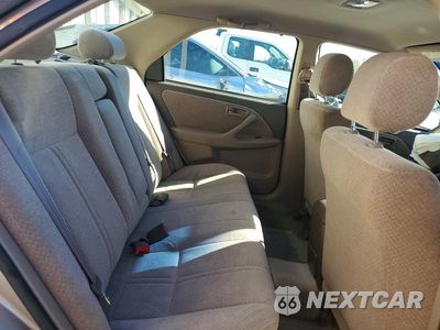 Zdjęcie 10 z 12 samochodu: 2000 TOYOTA CAMRY LE VIN:JT2BG22KXY0525294 - miniatura