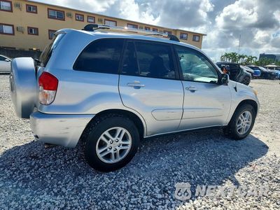 Trzecie zdjęcie samochodu z tyłu: 2003 TOYOTA RAV4 BASE VIN:JTEGH20V130101384 - miniatura