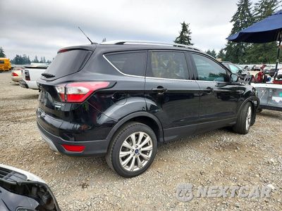 Trzecie zdjęcie samochodu z tyłu: 2017 FORD ESCAPE TITANIUM VIN:1FMCU0J9XHUD95786 - miniatura