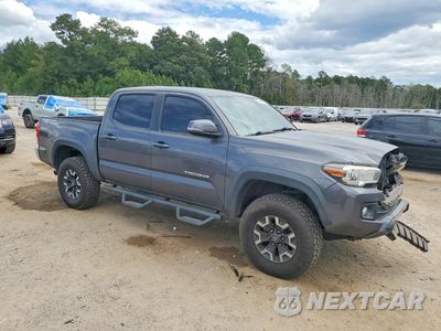 Czwarte zdjęcie samochodu z boku: 2016 TOYOTA TACOMA TRD OFF-ROAD VIN:3TMAZ5CN7GM002592 - miniatura