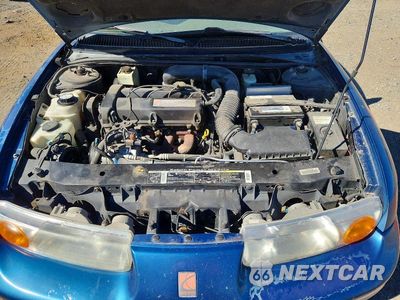Zdjęcie 11 z 12 samochodu: 2000 SATURN SL2 VIN:1G8ZK5271YZ115863 - miniatura