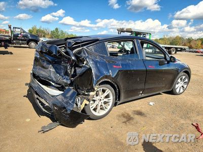 Trzecie zdjęcie samochodu z tyłu: 2023 TESLA MODEL Y VIN:7SAYGDEE6PA201326 - miniatura