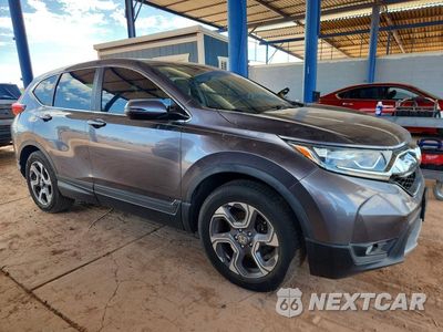 Czwarte zdjęcie samochodu z boku: 2018 HONDA CR-V EXL VIN:7FARW1H82JE021428 - miniatura