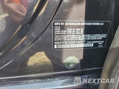 Zdjęcie 12 z 12 samochodu: 2014 BMW 750 LXI VIN:WBAYF8C50ED142577 - miniatura