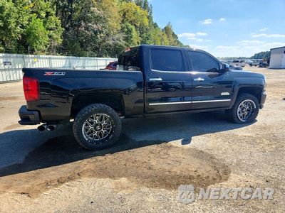 Trzecie zdjęcie samochodu z tyłu: 2018 CHEVROLET SILVERADO K1500 HIGH COUNTRY VIN:3GCUKTEJ8JG198273 - miniatura