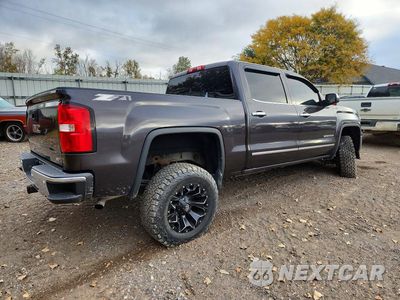 Trzecie zdjęcie samochodu z tyłu: 2015 GMC SIERRA K1500 SLT VIN:3GTU2VEC7FG248083 - miniatura