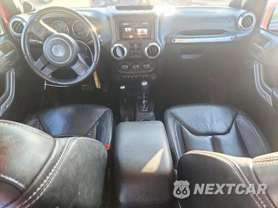Zdjęcie 8 z 13 samochodu: 2013 JEEP WRANGLER UNLIMITED SAHARA VIN:1C4BJWEG2DL571458 - miniatura