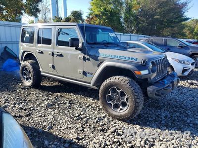 Czwarte zdjęcie samochodu z boku: 2022 JEEP WRANGLER UNLIMITED RUBICON 4XE VIN:1C4JJXR69NW198969 - miniatura