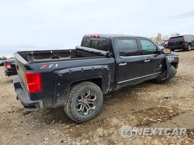 Trzecie zdjęcie samochodu z tyłu: 2018 CHEVROLET SILVERADO K1500 LTZ VIN:3GCUKSEJ4JG299823 - miniatura