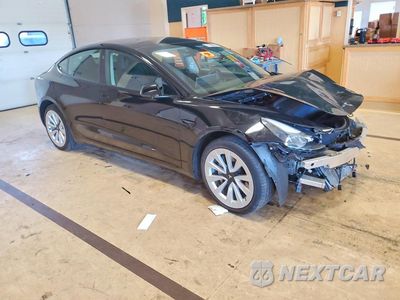 Czwarte zdjęcie samochodu z boku: 2022 TESLA MODEL 3 VIN:5YJ3E1EB6NF129884 - miniatura