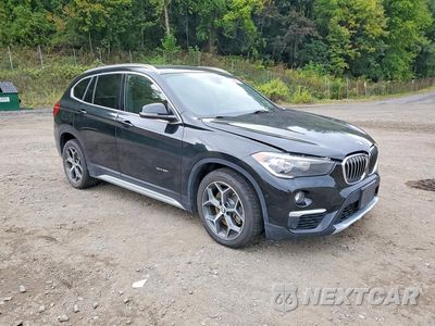 Czwarte zdjęcie samochodu z boku: 2018 BMW X1 XDRIVE28I VIN:WBXHT3Z39J4A66250 - miniatura
