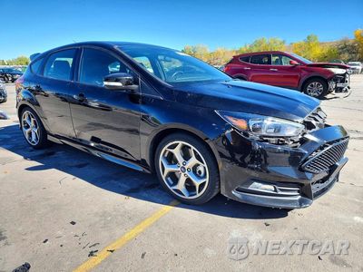 Czwarte zdjęcie samochodu z boku: 2017 FORD FOCUS ST VIN:1FADP3L96HL284503 - miniatura