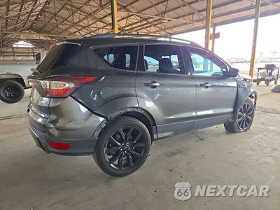 Trzecie zdjęcie samochodu z tyłu: 2017 FORD ESCAPE TITANIUM VIN:1FMCU9JD4HUB16082 - miniatura