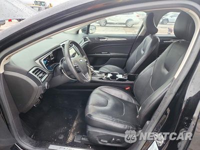 Zdjęcie 7 z 13 samochodu: 2016 FORD FUSION TITANIUM PHEV VIN:3FA6P0SU3GR121627 - miniatura