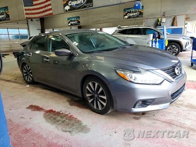 Czwarte zdjęcie samochodu z boku: 2017 NISSAN ALTIMA 2.5 SV VIN:1N4AL3AP3HC176629 - miniatura