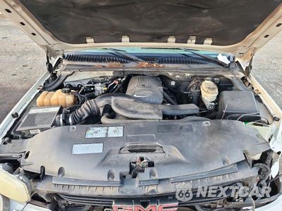Zdjęcie 12 z 14 samochodu: 2003 GMC YUKON XL K1500 VIN:3GKFK16Z93G310653 - miniatura