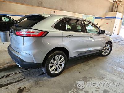 Trzecie zdjęcie samochodu z tyłu: 2020 FORD EDGE TITANIUM VIN:2FMPK3K92LBA15748 - miniatura