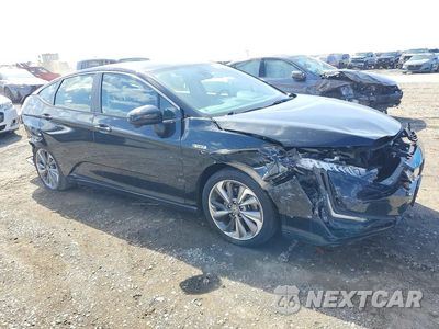 Czwarte zdjęcie samochodu z boku: 2018 HONDA CLARITY TOURING VIN:JHMZC5F39JC024051 - miniatura