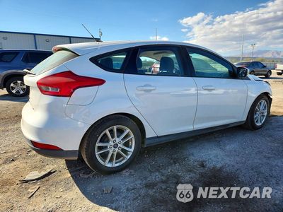 Trzecie zdjęcie samochodu z tyłu: 2016 FORD FOCUS SE VIN:1FADP3K28GL268676 - miniatura