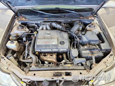 Zdjęcie 11 z 12 samochodu: 2003 TOYOTA AVALON XL VIN:4T1BF28B23U293840 - miniatura