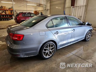 Trzecie zdjęcie samochodu z tyłu: 2015 VOLKSWAGEN JETTA SE VIN:3VWD07AJ1FM300800 - miniatura
