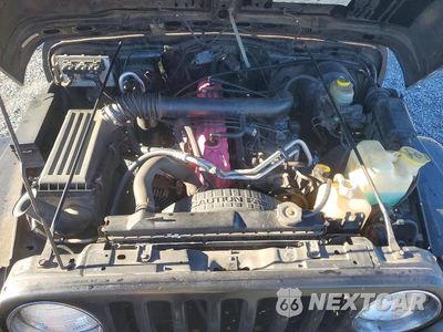 Zdjęcie 11 z 12 samochodu: 2000 JEEP WRANGLER / TJ SAHARA VIN:1J4FA59S4YP802394 - miniatura