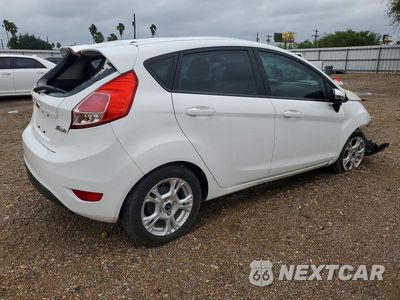 Trzecie zdjęcie samochodu z tyłu: 2015 FORD FIESTA SE VIN:3FADP4EJ1FM187122 - miniatura