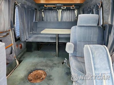 Zdjęcie 10 z 13 samochodu: 1991 CHEVROLET G20 VIN:1GBEG25KXM7132370 - miniatura