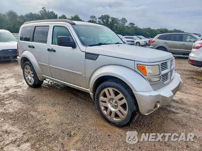 Czwarte zdjęcie samochodu z boku: 2011 DODGE NITRO HEAT VIN:1D4PT4GXXBW606697 - miniatura