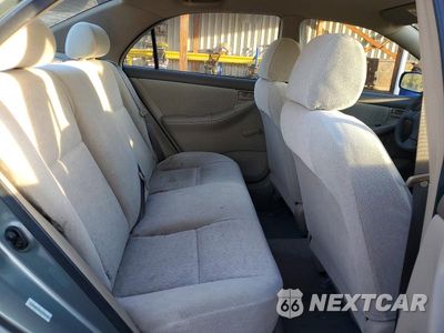 Zdjęcie 10 z 12 samochodu: 2003 TOYOTA COROLLA CE VIN:1NXBR32E93Z084157 - miniatura