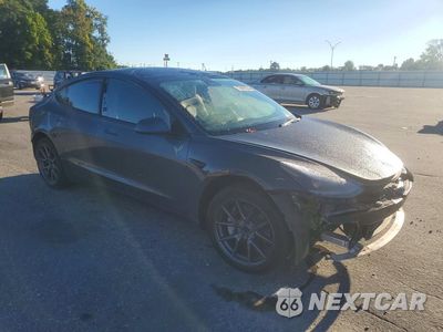 Czwarte zdjęcie samochodu z boku: 2023 TESLA MODEL 3 VIN:5YJ3E1EA5PF497449 - miniatura