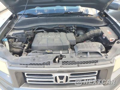 Zdjęcie 11 z 12 samochodu: 2007 HONDA RIDGELINE RTS VIN:2HJYK16427H510364 - miniatura