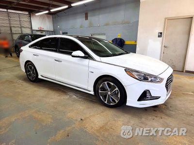 Czwarte zdjęcie samochodu z boku: 2019 HYUNDAI SONATA HYBRID LIMITED VIN:KMHE34L33KA092594 - miniatura