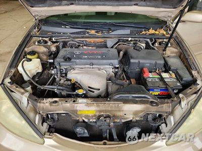 Zdjęcie 11 z 12 samochodu: 2004 TOYOTA CAMRY LE VIN:4T1BE32K64U868251 - miniatura
