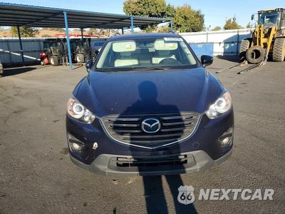 Piąte zdjęcie samochodu w środku: 2016 MAZDA CX-5 GT VIN:JM3KE2DY8G0880114 - miniatura