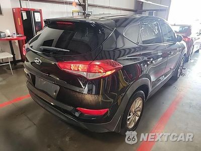 Czwarte zdjęcie samochodu z boku: 2016 HYUNDAI TUCSON SE VIN:KM8J23A46GU196073 - miniatura