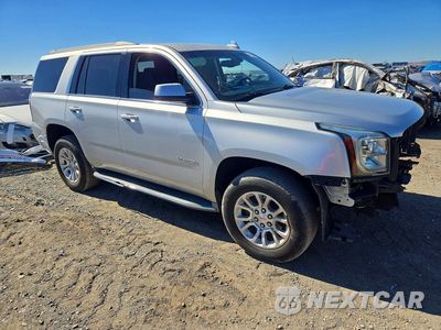 Czwarte zdjęcie samochodu z boku: 2015 GMC YUKON SLE VIN:1GKS1AKC9FR662994 - miniatura