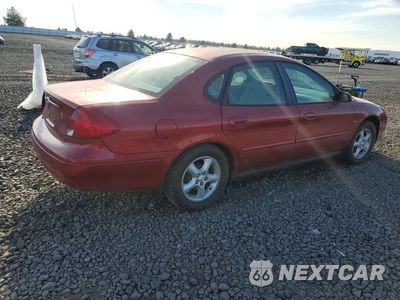 Trzecie zdjęcie samochodu z tyłu: 2000 FORD TAURUS SES VIN:1FAFP5525YG200345 - miniatura