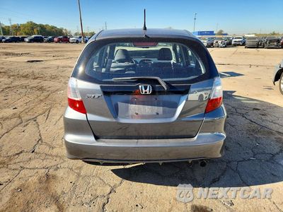 Zdjęcie 6 z 12 samochodu: 2011 HONDA FIT VIN:JHMGE8H38BS008222 - miniatura