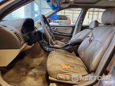 Zdjęcie 7 z 13 samochodu: 2000 NISSAN MAXIMA GXE VIN:JN1CA31D4YT521040 - miniatura