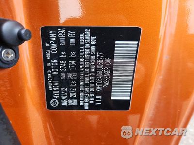 Zdjęcie 12 z 12 samochodu: 2012 HYUNDAI VELOSTER BASE VIN:KMHTC6AD6CU066277 - miniatura