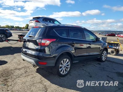 Trzecie zdjęcie samochodu z tyłu: 2017 FORD ESCAPE TITANIUM VIN:1FMCU9J98HUE43855 - miniatura