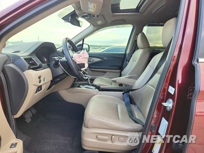 Zdjęcie 7 z 13 samochodu: 2021 HONDA PILOT TOURING VIN:5FNYF5H94MB037271 - miniatura