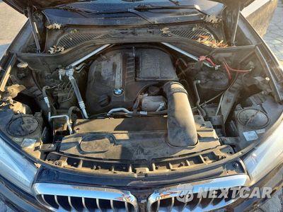 Zdjęcie 12 z 13 samochodu: 2014 BMW X5 XDRIVE35I VIN:5UXKR0C59E0H17270 - miniatura
