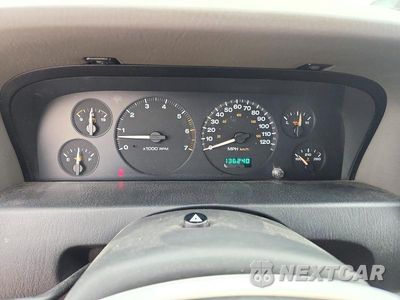 Zdjęcie 9 z 12 samochodu: 2004 JEEP GRAND CHEROKEE LAREDO VIN:1J4GW48N24C328832 - miniatura