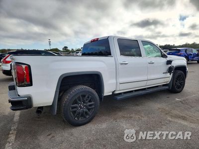 Trzecie zdjęcie samochodu z tyłu: 2017 GMC SIERRA K1500 SLT VIN:3GTU2NEC9HG394097 - miniatura