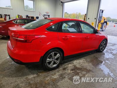 Trzecie zdjęcie samochodu z tyłu: 2016 FORD FOCUS SE VIN:1FADP3FE7GL201992 - miniatura
