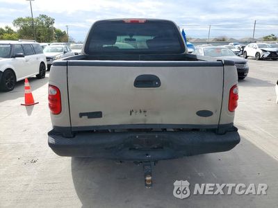 Zdjęcie 6 z 12 samochodu: 2001 FORD F150 SUPERCREW VIN:1FTRW07L11KC06911 - miniatura